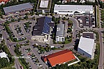 Einkaufszentrum und Gewerbegebiet an am Hainbuchenring in Neuried im Bundesland Bayern. Aldi, Rewe, Tengelmann, Vinzenz Murr, DM und Rossmann Drogeriemarkt, Orterer Getränkemarkt, KIK, TUI Reisecenter, GP Inspect, GPsolar, Stiebel Eltron.